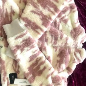 White and purple sweater